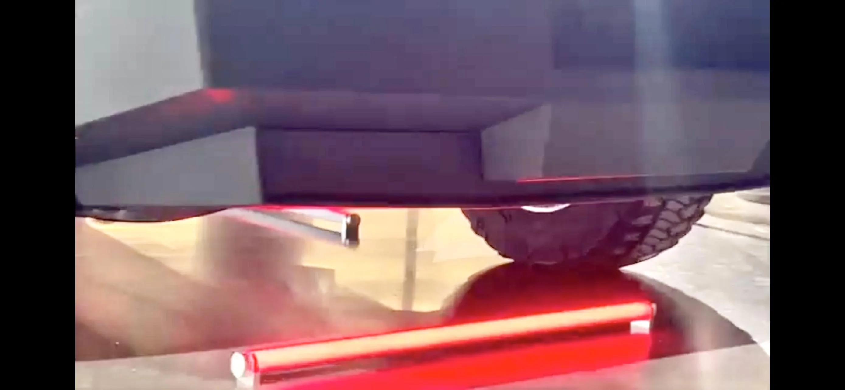 Tesla Cybertruck What is this wedge looking piece coming off the side of tail gate ? F0F0E170-043A-431B-8C44-57279693FB68