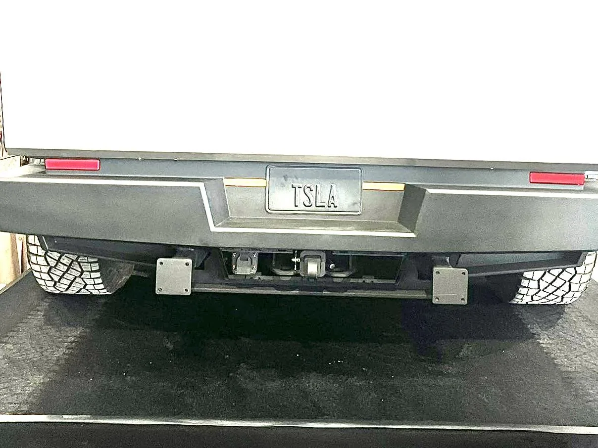 Tesla Cybertruck What is this wedge looking piece coming off the side of tail gate ? 1DF1A4B8-8694-48C7-AB9A-CCD9D12FAC70