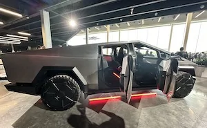 Tesla Cybertruck Petrol-based Cybertruck.v. Soy-based please tesla-investor-day-the-cybertruck-shows-a-squarish-steering-wheel-drop-front-center-seat_4