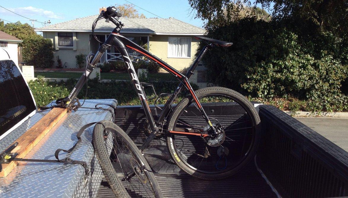 Tesla Cybertruck Mountain bikes inside the bed when covered/closed bikerack