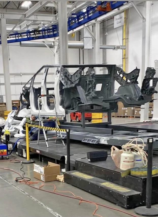 Tesla Cybertruck Are these Cybertruck Castings? tesla cybertruck body shell frame reveal giga factory texas