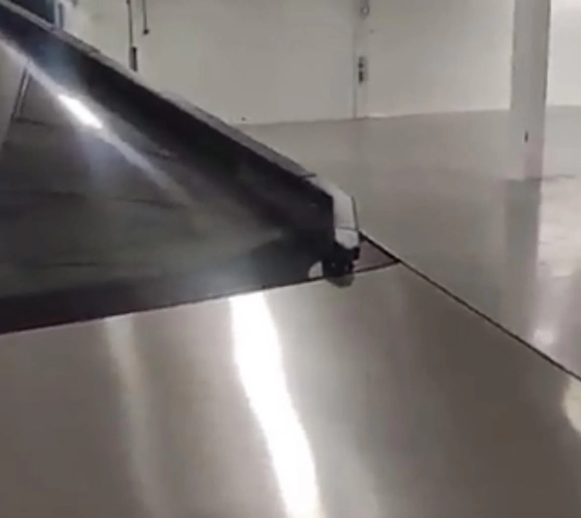 Tesla Cybertruck Cybertruck spotted with frunk open, revealing waterfall design! FDC9750B-82F8-48D5-9AB2-19776A718FFA