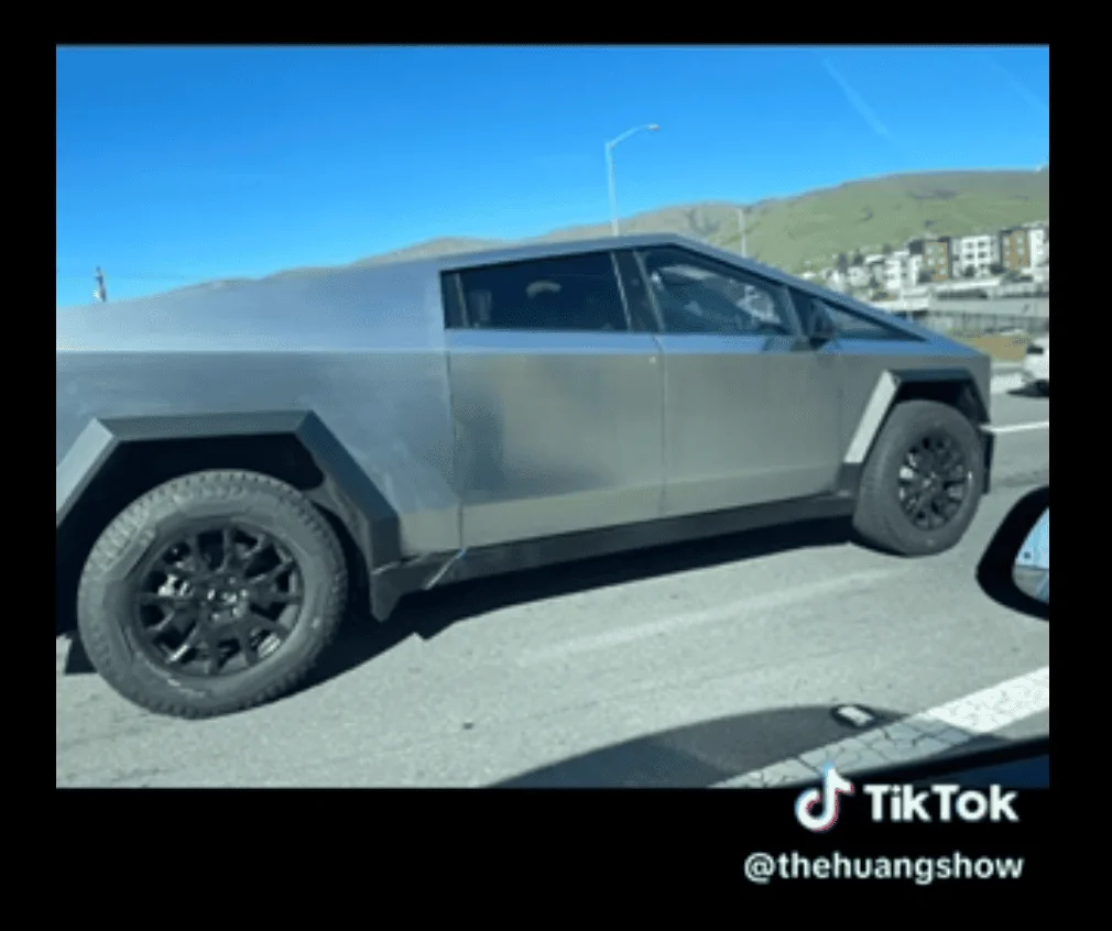 Tesla Cybertruck Cybertruck spotted driving next to Chevy Silverado! 1682457839555