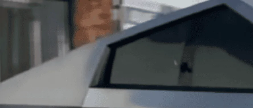 Tesla Cybertruck What's this? Are they fly window locks? Cameras for the Leno show? Rear window locks to fold it down? 1592380532325