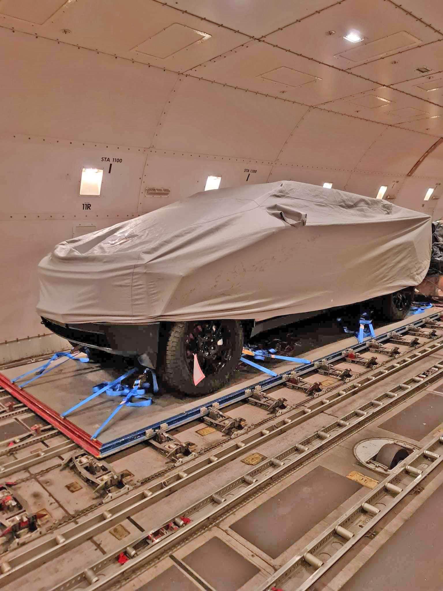Tesla Cybertruck 2nd Cybertruck en route to winter testing (w/ no seats, no floor (battery), yoke steering wheel)! Pics on plane from Singapore ✈️ New Zealand Cybertruck transport plane to New Zealand 3