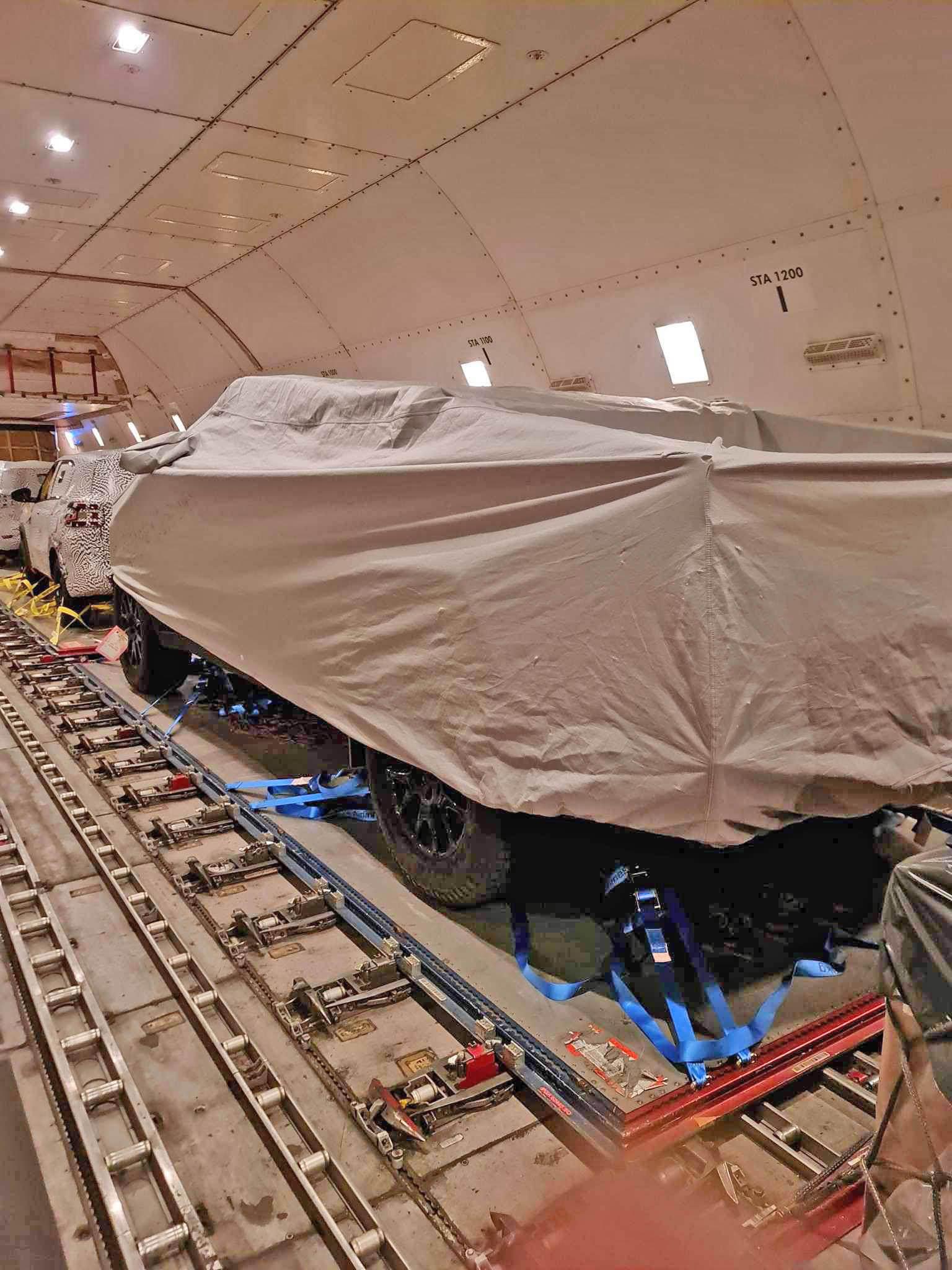Tesla Cybertruck 2nd Cybertruck en route to winter testing (w/ no seats, no floor (battery), yoke steering wheel)! Pics on plane from Singapore ✈️ New Zealand Cybertruck transport plane to New Zealand 4