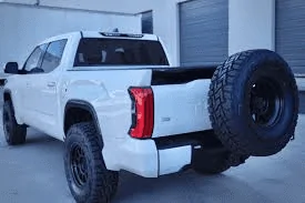 Tesla Cybertruck Cybertruck vault sub-trunk fully opened! + Tonneau cover and tailgate lowering in action! 1687809932083