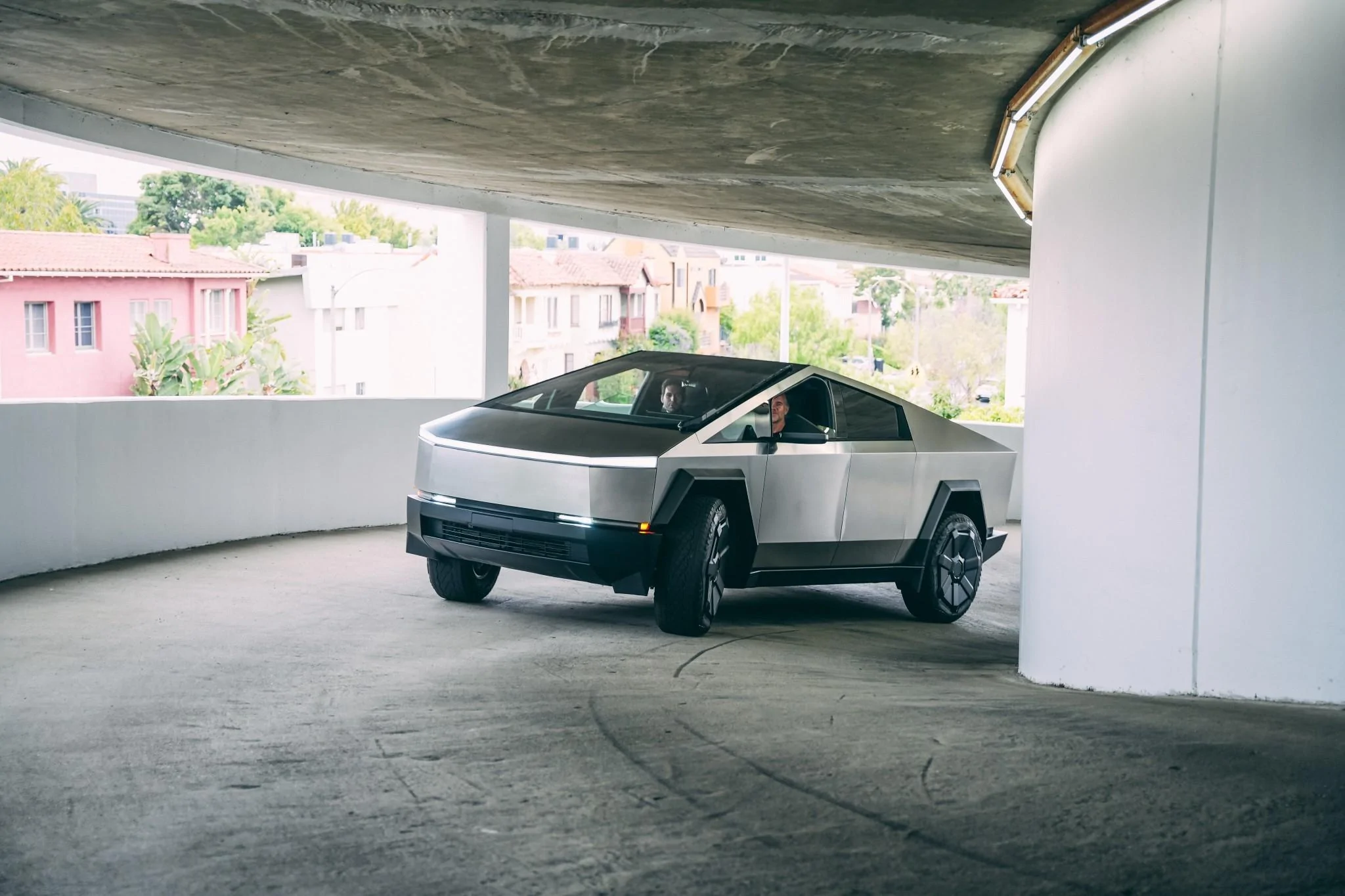 Tesla Cybertruck (Pics) Auto evolution wrote an article about cars and coffee cybertruck tesla-cybertruck-features-sliding-sun-visors-and-no-handles-in-the-cockpit_1
