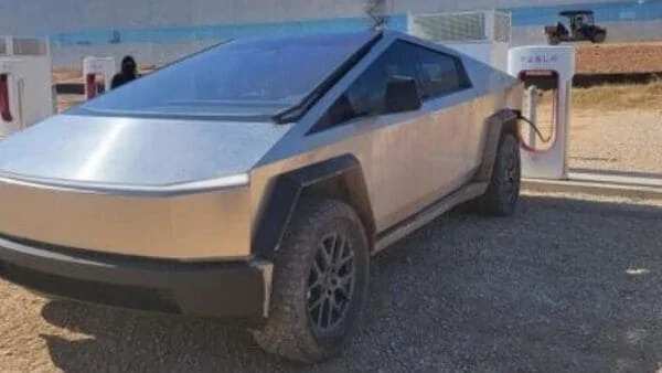 Tesla Cybertruck Will supercharger cords reach Cybertruck charge port? Tesla_1643543046310_1643543060832