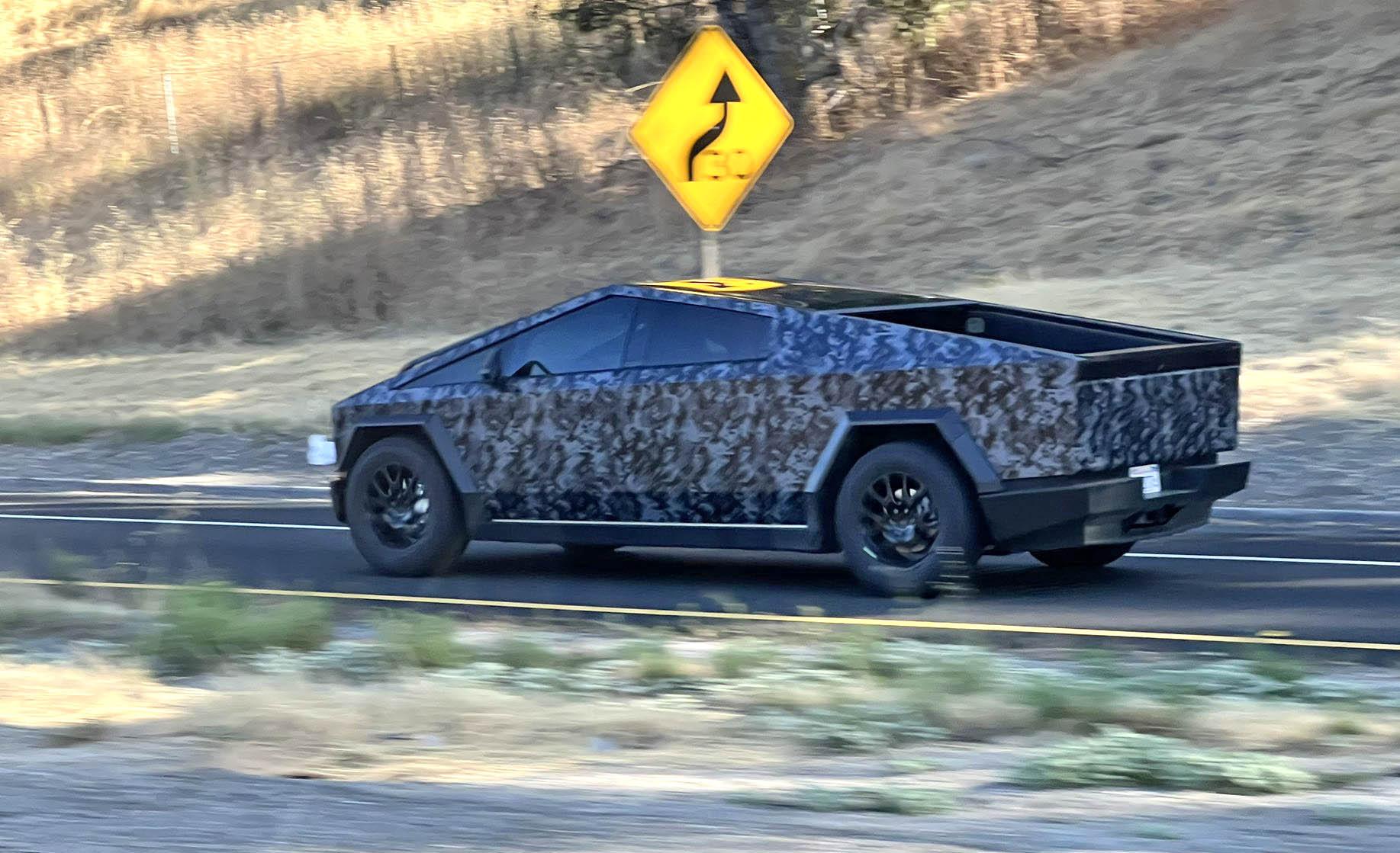 Tesla Cybertruck New dark digital camo + tinted Cybertruck appears on the 280 in CA! 🤳 dark-camo-tesla-cybertruck-wrap-
