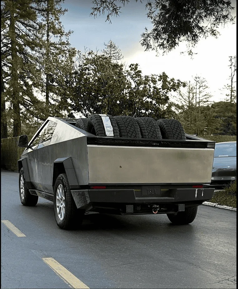 Tesla Cybertruck F-150 Wrapped Cybertruck Spotted Driving & Showing Hitch 1690478251882