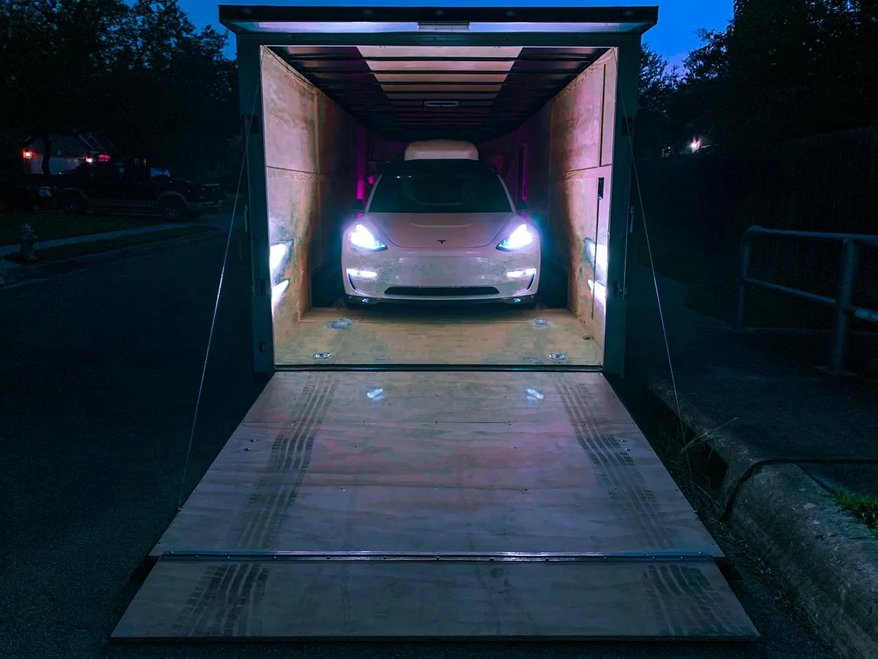 Tesla Cybertruck Cybertruck in enclosed trailer w/ folded mirrors + tire size -- video IMG_7634