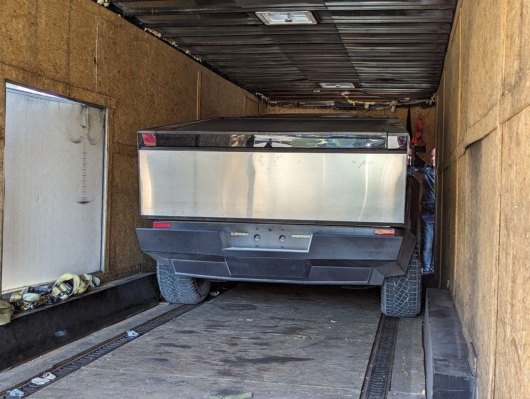 Tesla Cybertruck Cybertruck in enclosed trailer w/ folded mirrors + tire size -- video IMG_0886