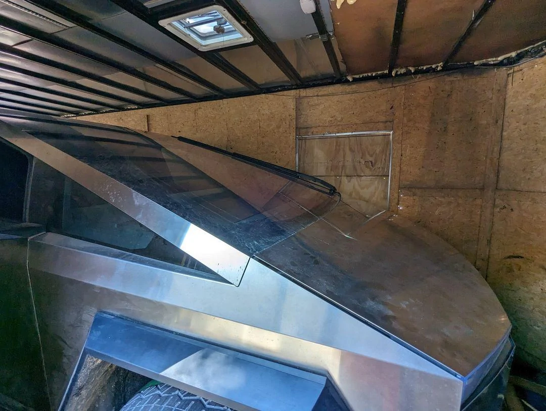 Tesla Cybertruck Cybertruck in enclosed trailer w/ folded mirrors + tire size -- video IMG_0887