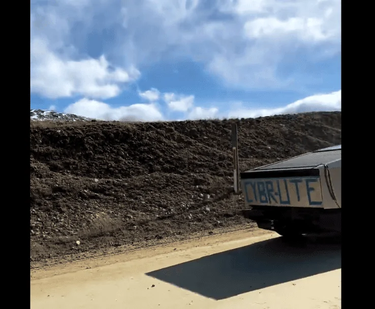 Tesla Cybertruck Cybertruck "512 CYBR-UTE" in short video clip, followed by Model S 1691938189712