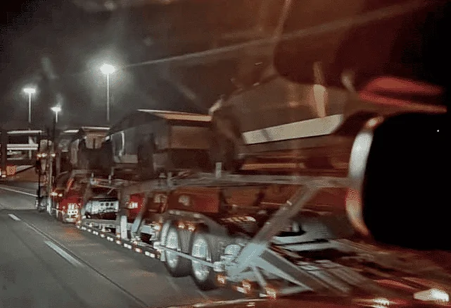 Tesla Cybertruck Semis transporting Cybertrucks spotted on freeway Car-Carrier-CT-Night