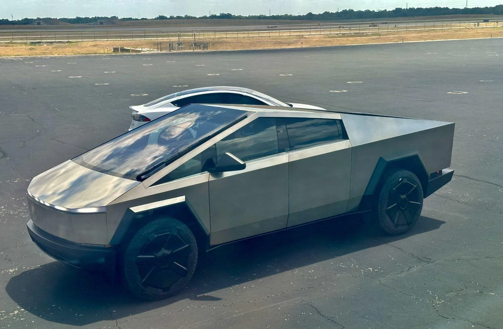 Tesla Cybertruck Elon Musk: "Just drove the production candidate Cybertruck at Tesla Giga Texas!" -- "This Is Our Best Product Ever" 🙌 elon-musk-driving-cybertruck-jpeg