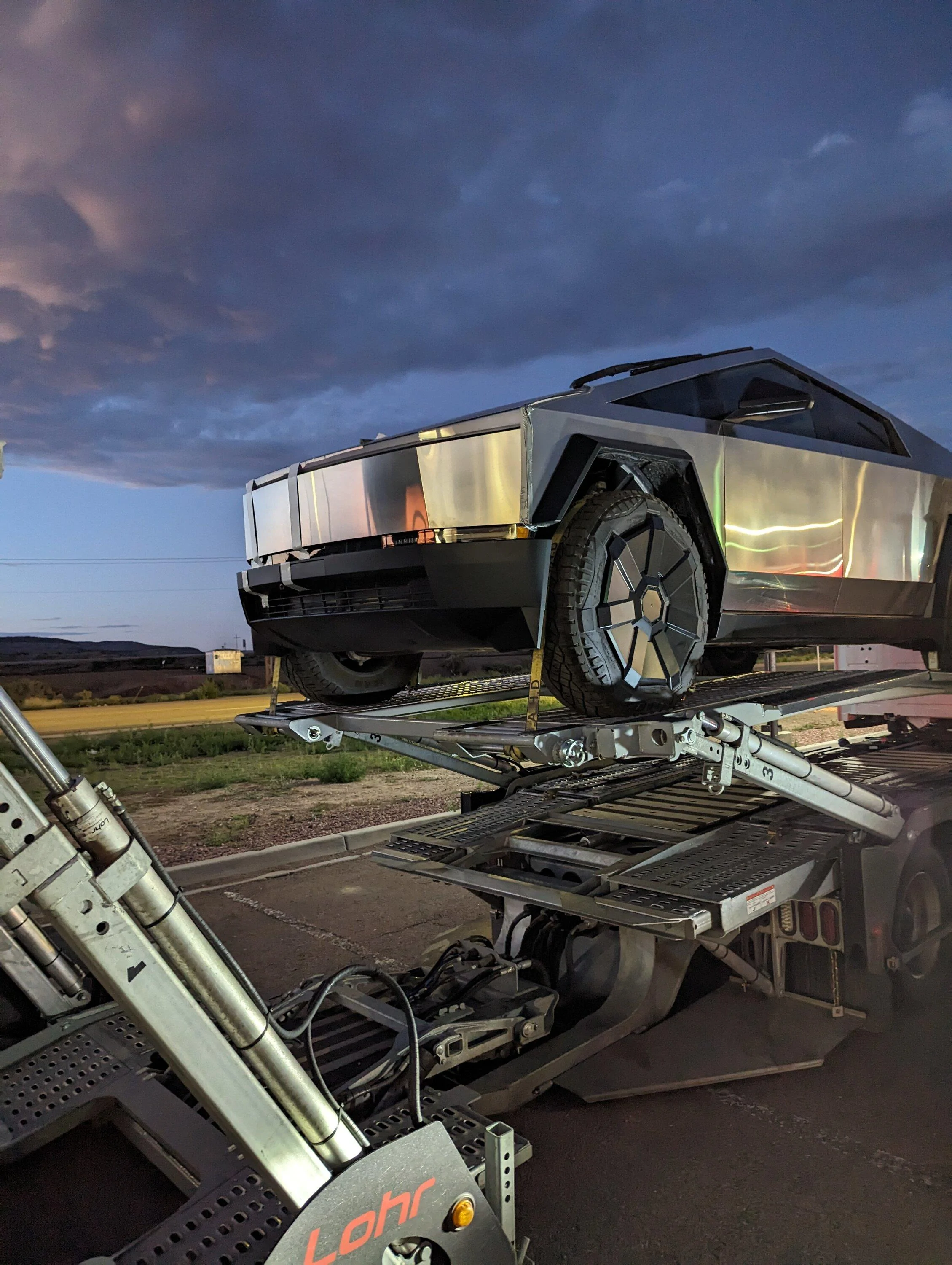 Tesla Cybertruck Fleet of Cybertrucks loading onto carriers at Giga Texas -- video from 8/26/23 pxl_20230828_021844954-jpg