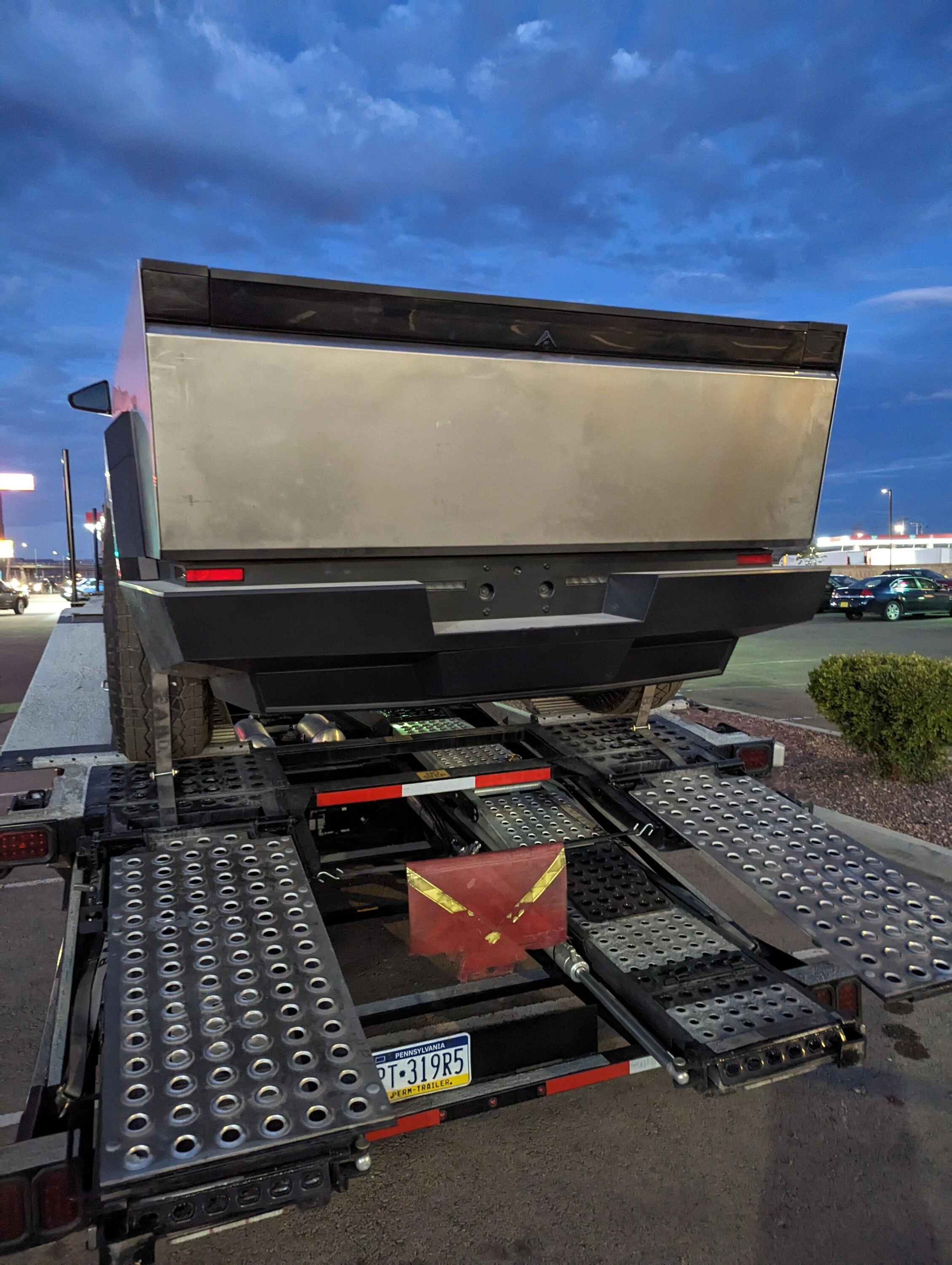 Tesla Cybertruck Fleet of Cybertrucks loading onto carriers at Giga Texas -- video from 8/26/23 pxl_20230828_021646413-jpg