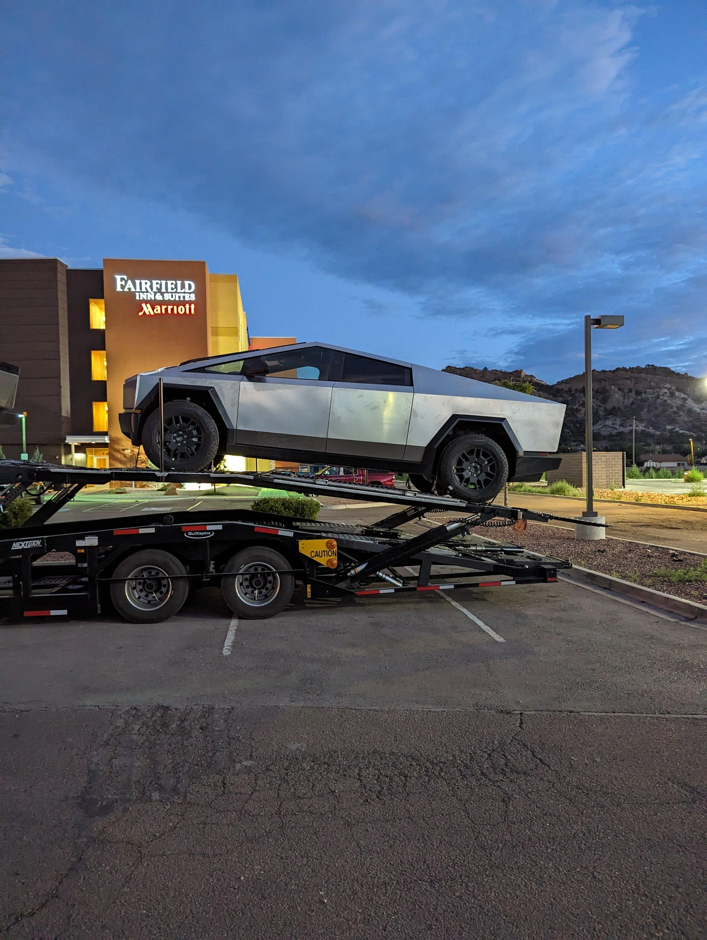 Tesla Cybertruck Fleet of Cybertrucks loading onto carriers at Giga Texas -- video from 8/26/23 pxl_20230828_021627746-mp-jpg