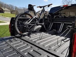 Tesla Cybertruck Spotted: Bike carried in Cybertruck vault bed 1693687882860