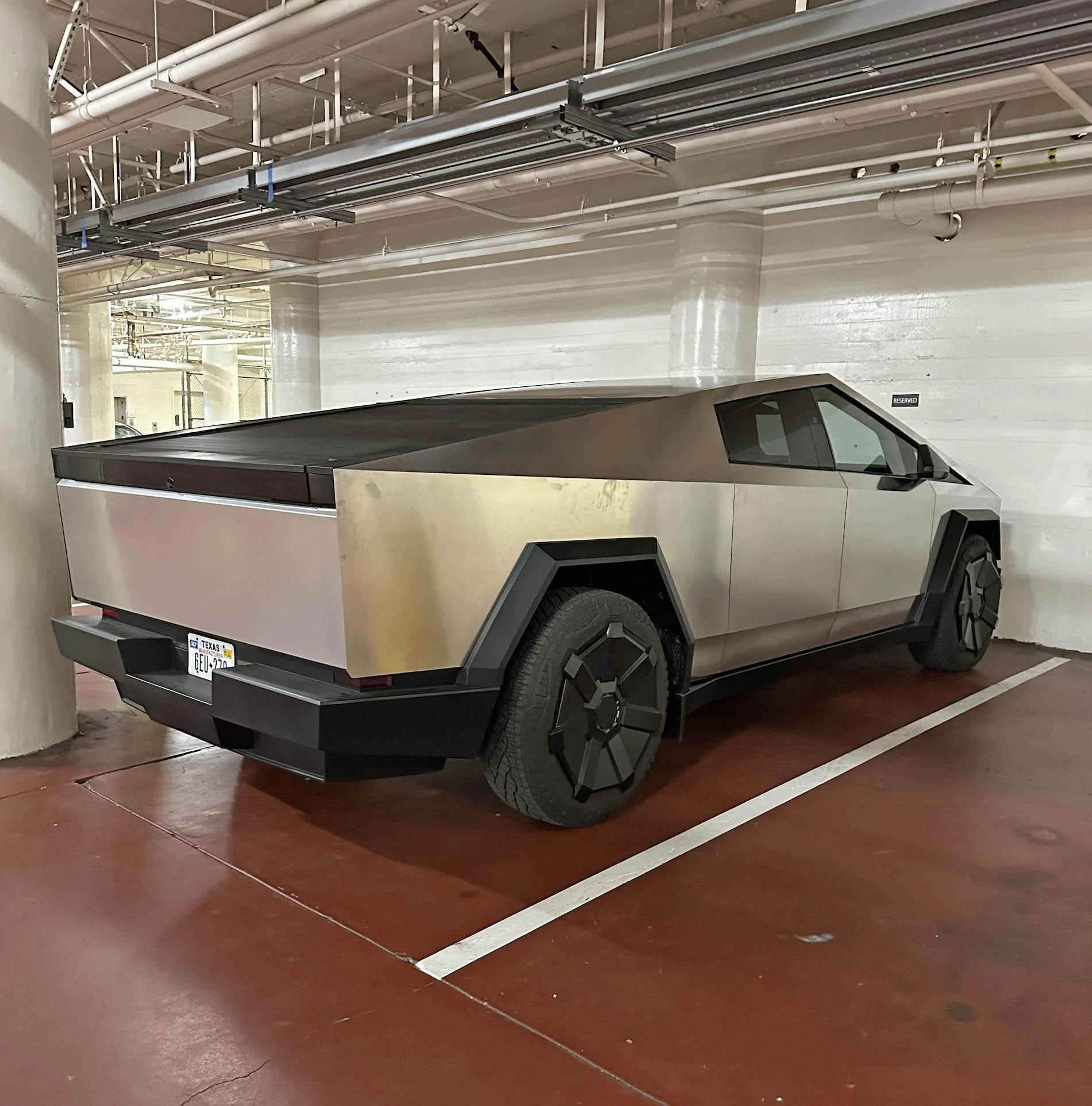 Tesla Cybertruck Cybertruck spotted parked in X (Twitter) building garage teslacybertruckparkinggarage1