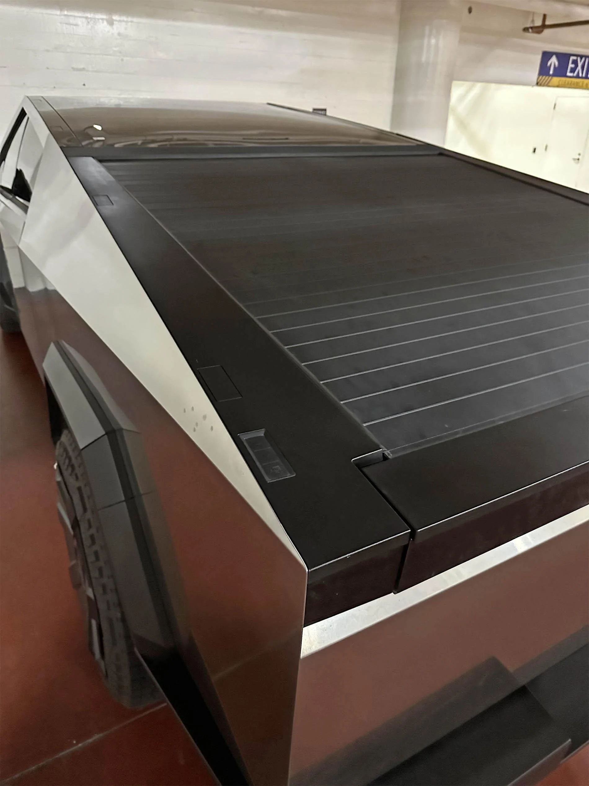 Tesla Cybertruck Cybertruck spotted parked in X (Twitter) building garage teslacybertruckparkinggarage-jpg