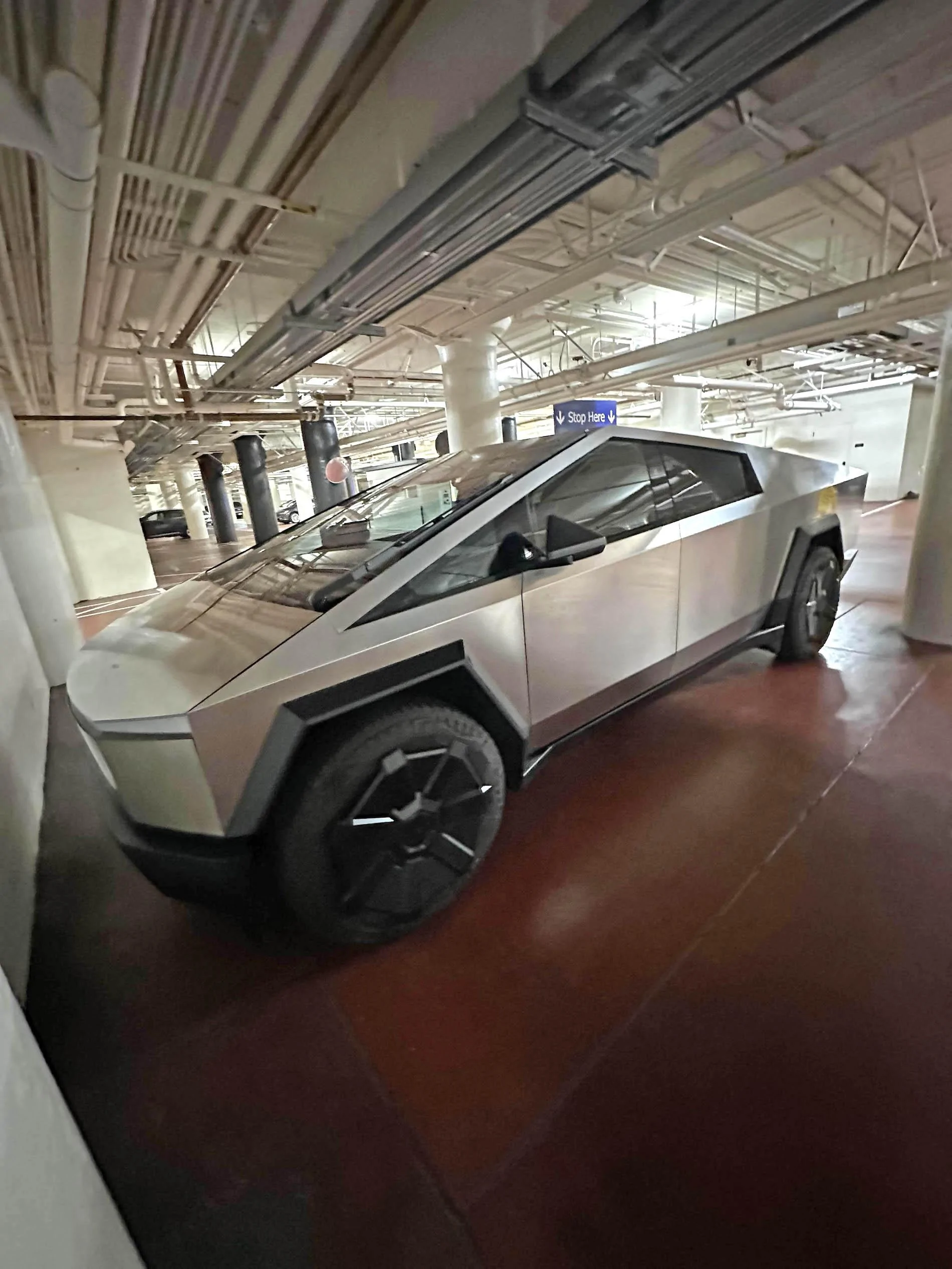 Tesla Cybertruck Cybertruck spotted parked in X (Twitter) building garage F5h0LMYboAAW-ZK