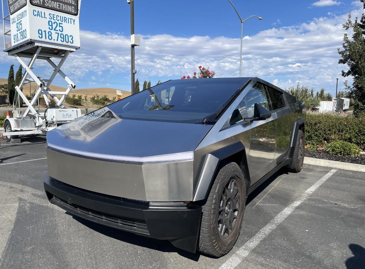 Tesla Cybertruck Cybertruck parked on street in residential neighborhood [9/9 pics] 653hrxydsbnb1