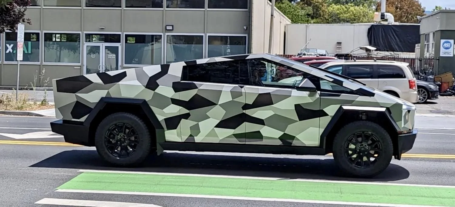 Tesla Cybertruck Cybertruck in raised suspension height supercharging at Giga Texas [9/9 pics] 03D7DDEC-6A9F-4BB9-8589-AF03E1BFA51D