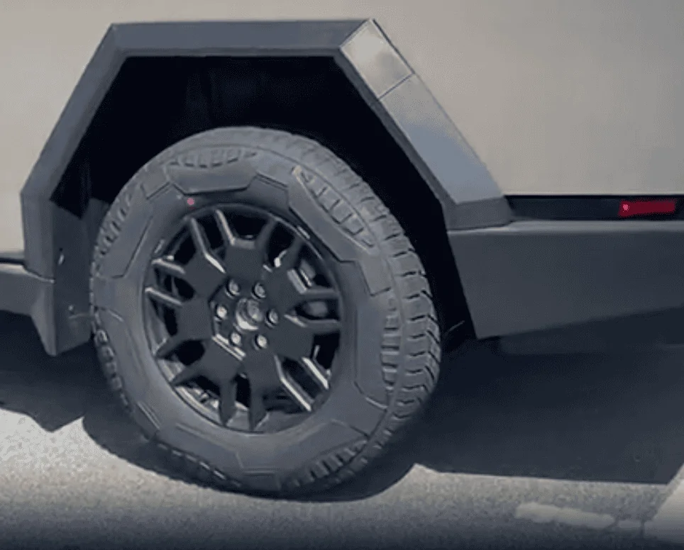 Tesla Cybertruck Video: Cybertruck Vents Air Suspension Pressure While Lowering! 💨 + Close Look at Bed Vault! Screenshot 2023-09-14 at 16.16.45