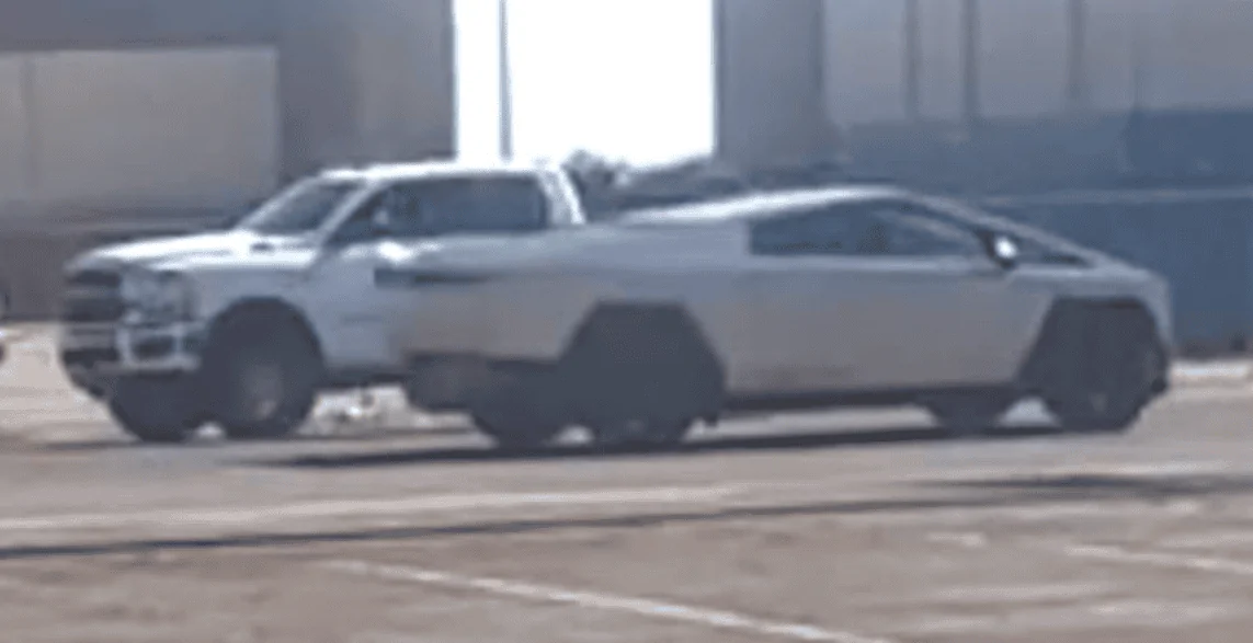 Tesla Cybertruck Cybertruck spotted in Central Valley CA, passing Dodge Ram for size comparison 1694740527016