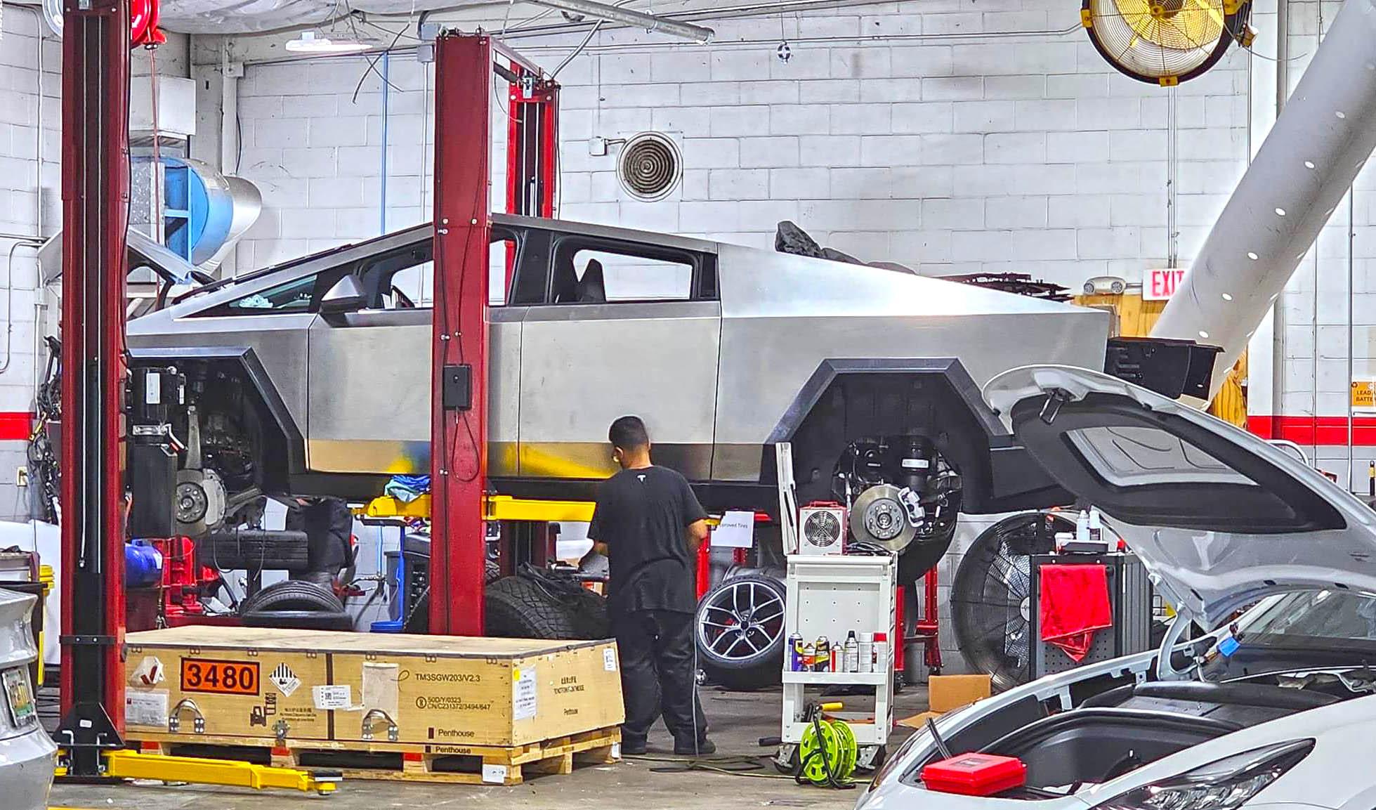 Tesla Cybertruck Cybertruck suspension & brakes exposed on a lift (photos 9/16/23) tesla cybertruck suspension brakes