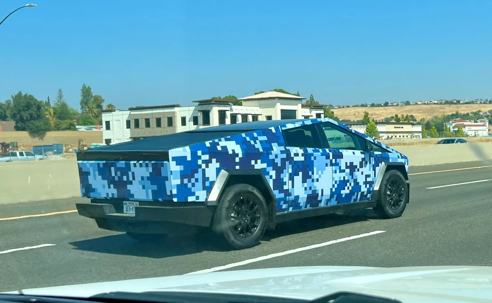 Tesla Cybertruck [Videos added] Cybertruck gets new wrap! Minecraft low-res digital camo style 📸 381216384_10160916692957974_7259097563053262589_n