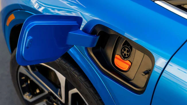 Tesla Cybertruck EV tax Credit Analysis - Consumer Reports ero-2024-Chevrolet-Equinox-EV-3LT-charge-door-3-23