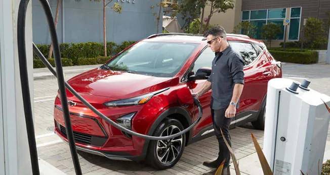 Tesla Cybertruck EV tax Credit Analysis - Consumer Reports ineHero-EVGo-2022-Chevrolet-Bolt-EUV-charging-3-23