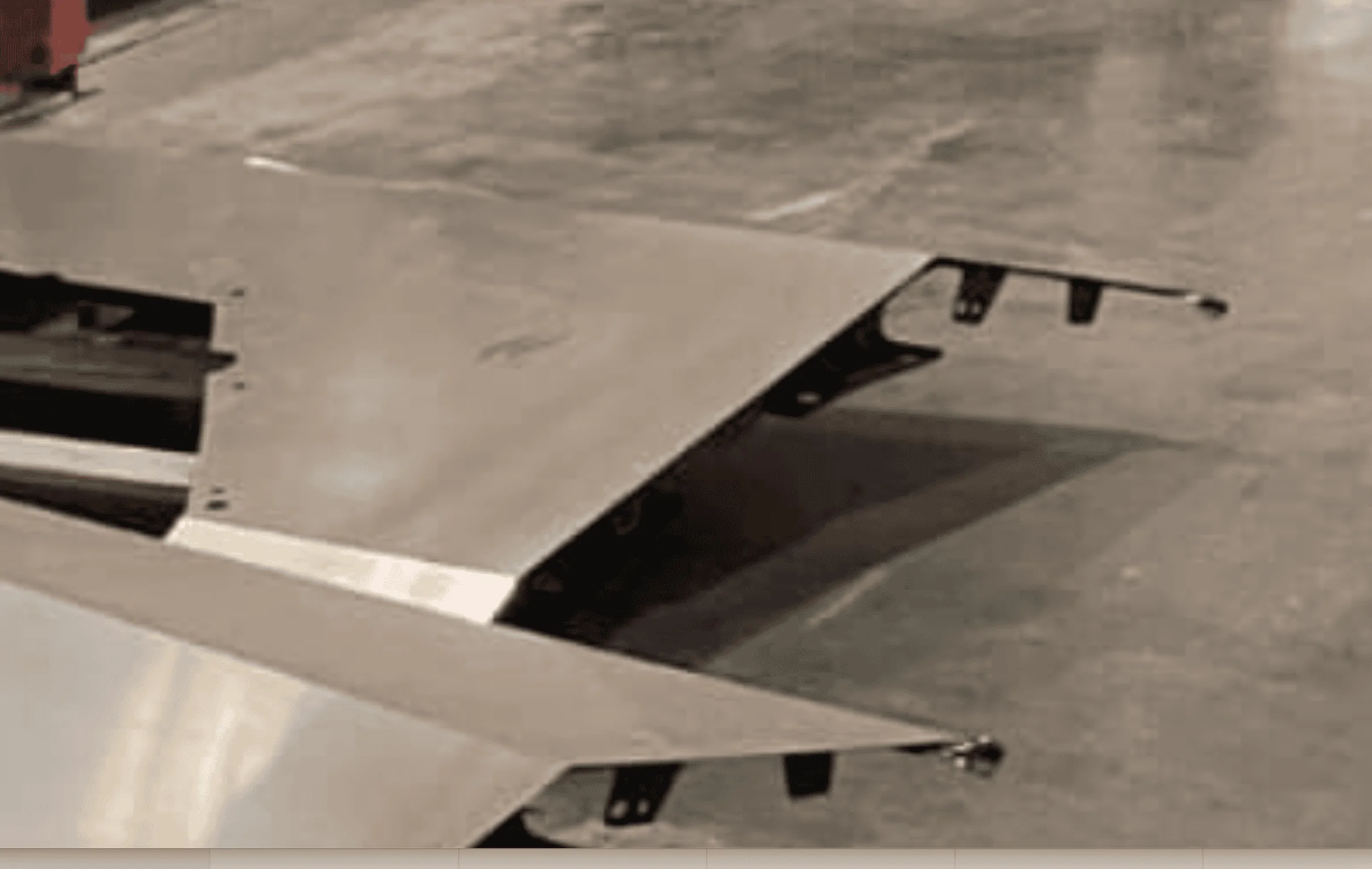 Tesla Cybertruck Unassembled fender quarter panels stainless steel parts on Giga Texas factory floor Screenshot 2023-10-03 at 09.15.15