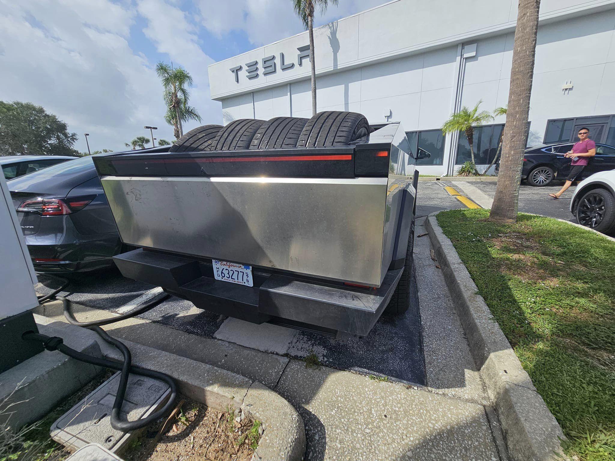 Tesla Cybertruck Cybertruck spotted carrying 8 tires in bed! @ Tesla Store in Merritt Island, FL 385036347_6653861968036680_2245218714788180347_n