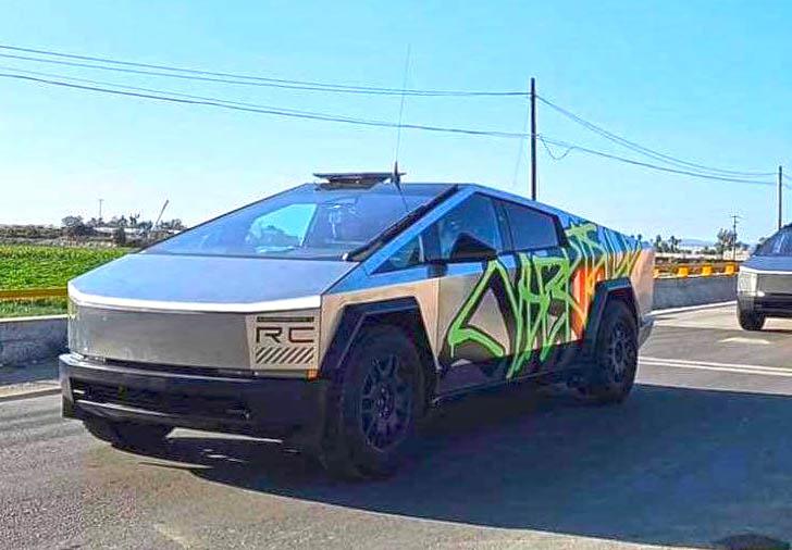 Tesla Cybertruck Graffiti Cybertruck spotted with Starlink Antenna Receiver Mounted on Roof Grafitti wrap Cybertruck starlink antenna receiver