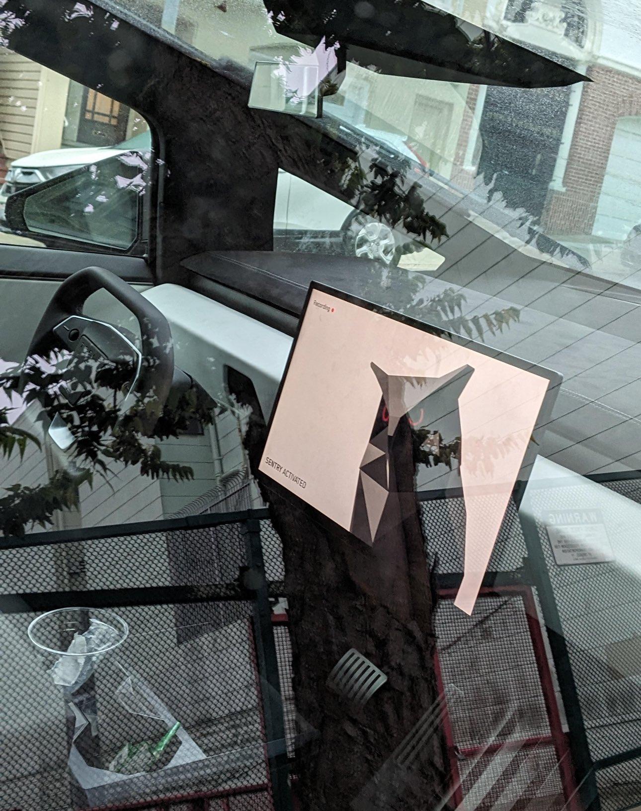 Tesla Cybertruck Sentry Mode Cyber Owl Screen seen in parked Cybertruck F8fOO2gbsAAXvc3