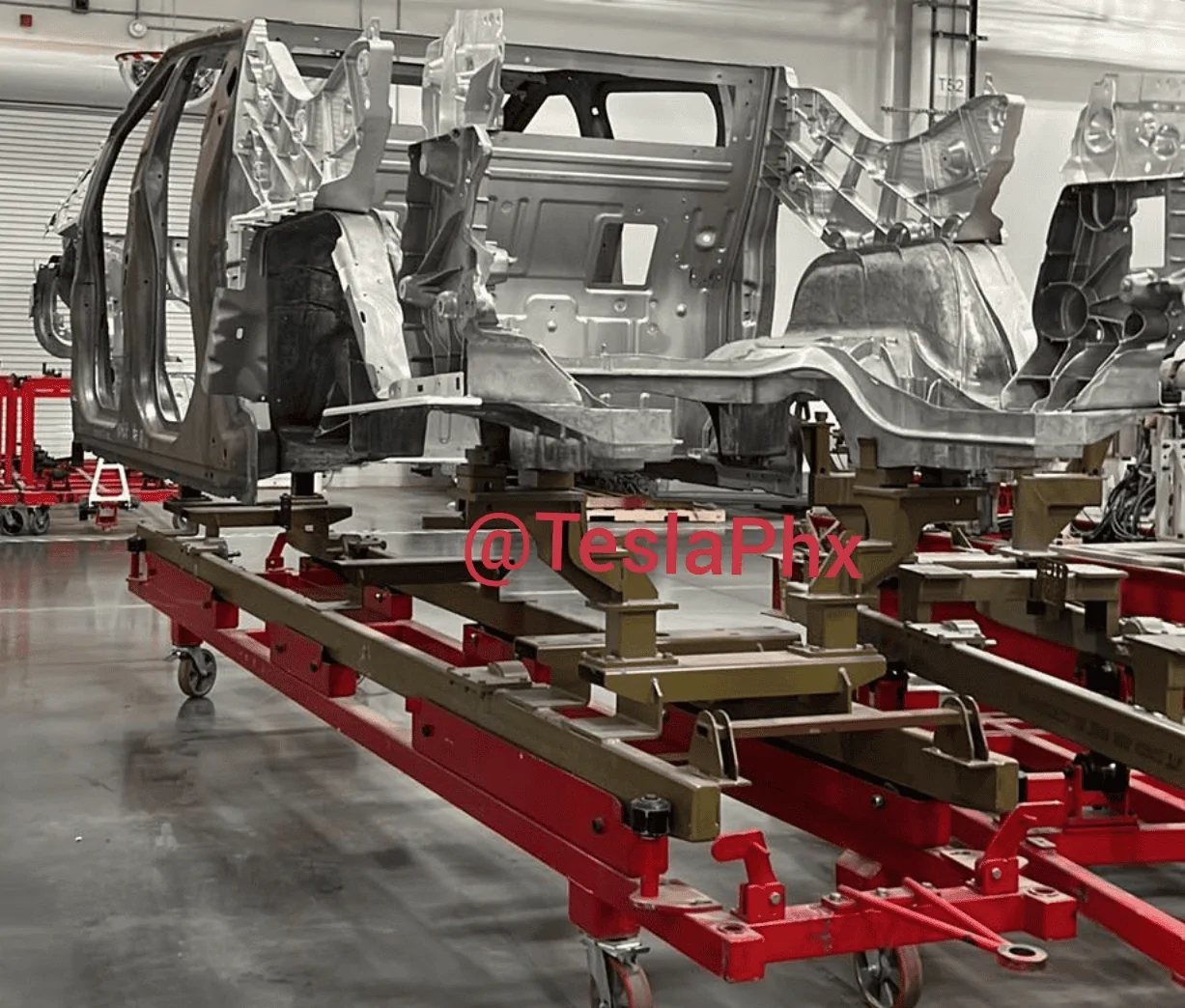 Tesla Cybertruck Cybertruck frame / casting / chassis / body structure in plain sight outside Giga Texas 🧐 1697565760430