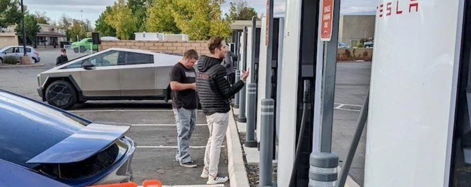 Tesla Cybertruck First Cybertruck charging at V4 Supercharger with longer charging cable. Cybertruck v4 supercharging station longer cord