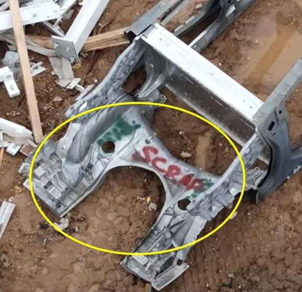 Tesla Cybertruck Cybertruck frame in scrap yard shows no midgate and other details 395896772_347187371312586_7706144760811846645_n_annotated_rear_casting