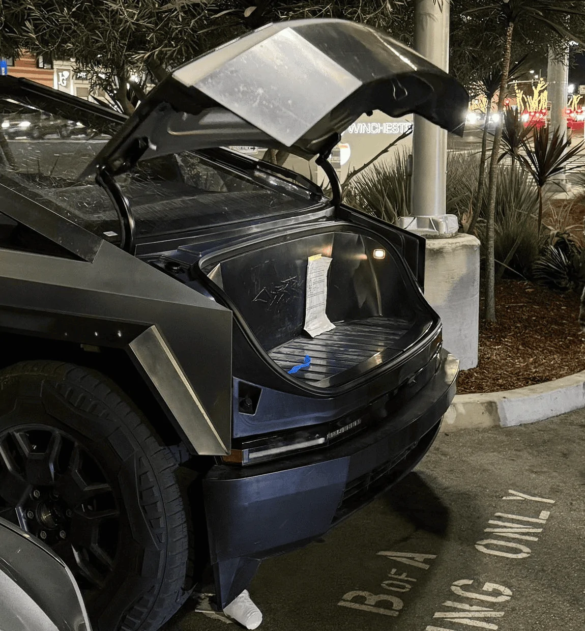 Tesla Cybertruck Powered Frunk In Action! Great shots!! 1698471070877