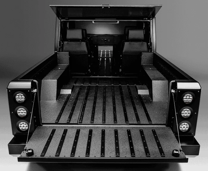 Tesla Cybertruck Video: Cybertruck tonneau cover opening, bed lighting, and tailgate dropping 1698771379379