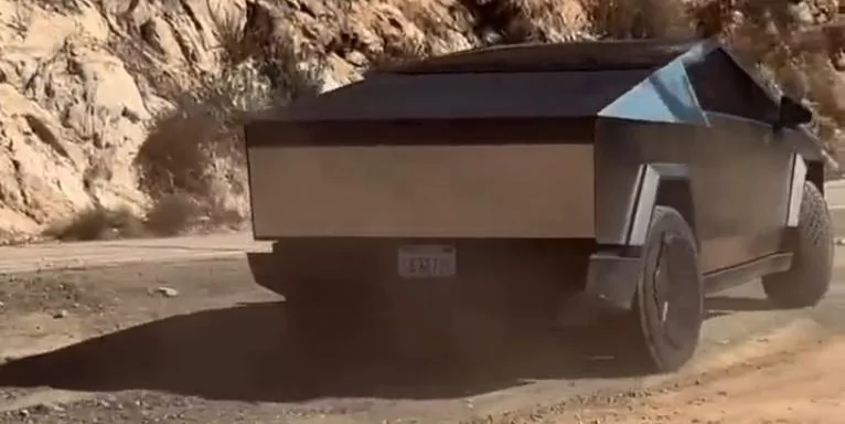 Tesla Cybertruck Cybertruck spotted on mountain canyon run. Check out that turning radius Turn radius 24 foot two lane road