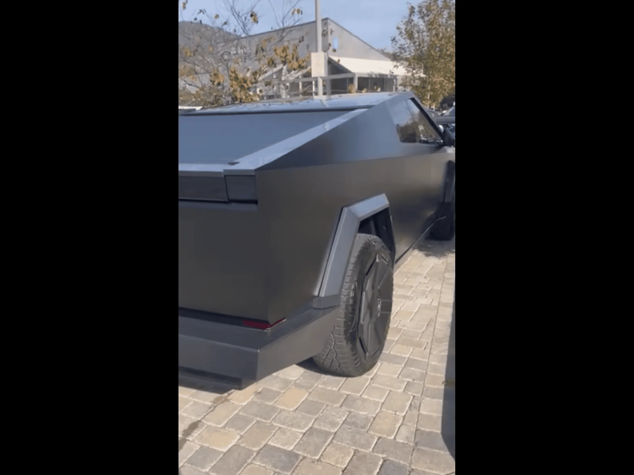 Tesla Cybertruck Matte Black Cybertruck Finally Appears!! 😱 Driven by Franz Von Holzhausen 89a772de-8bea-479e-9f1e-947fbcb5ced5-png