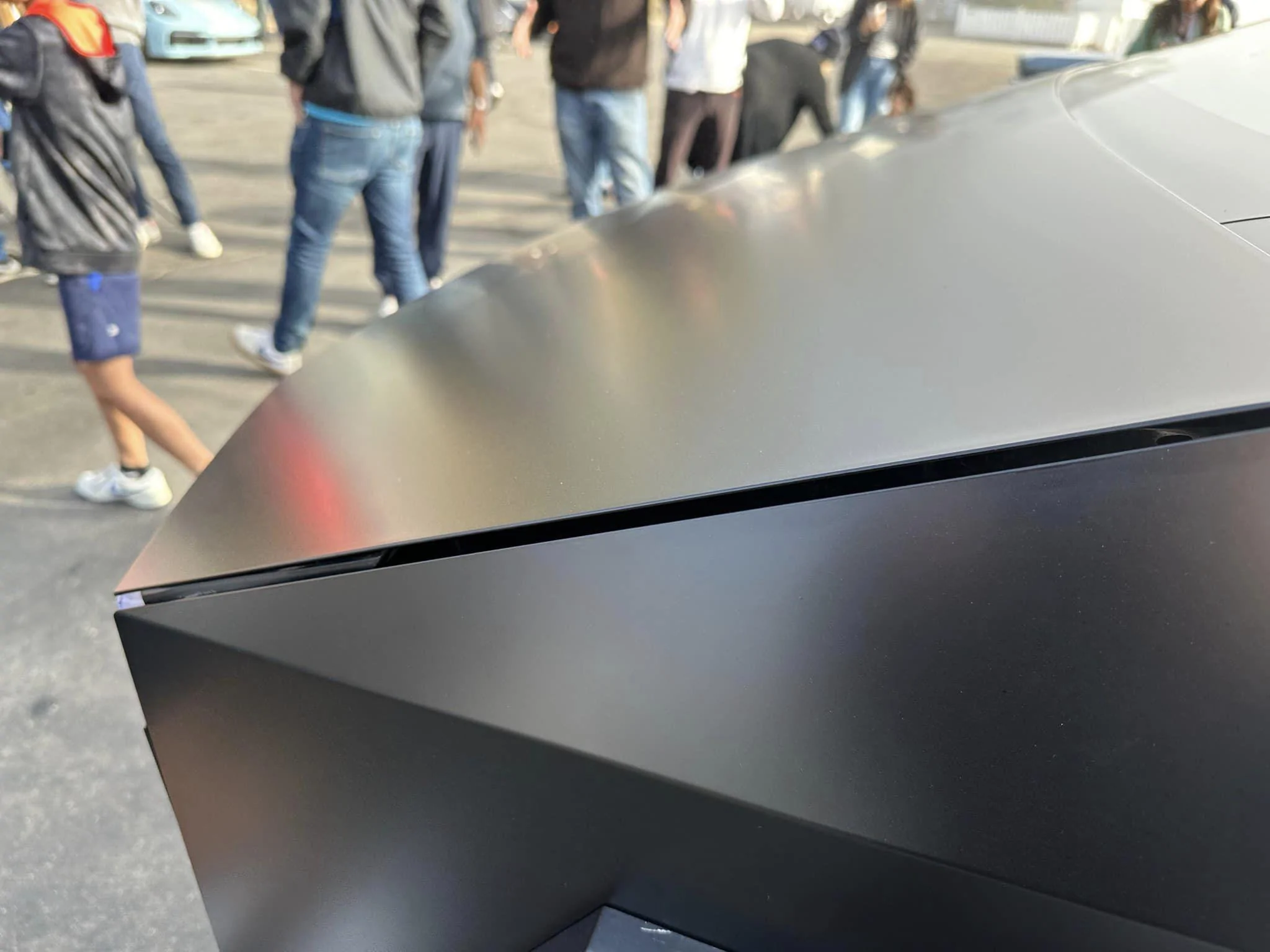 Tesla Cybertruck Matte Black Cybertruck Finally Appears!! 😱 Driven by Franz Von Holzhausen 399817632_6793351280740429_2342493229030612448_n
