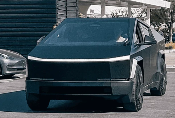 Tesla Cybertruck Matte Black Cybertruck Finally Appears!! 😱 Driven by Franz Von Holzhausen black-matte-cybertruck-design-studio3-png
