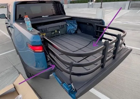 Tesla Cybertruck First inside perspective garage pic: Cybertruck parked w/ bed lighting on and bike in bed F5Vthvm